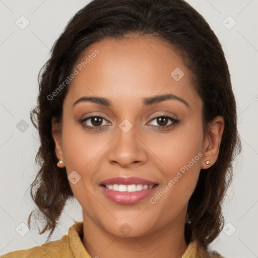 Joyful latino young-adult female with long  brown hair and brown eyes