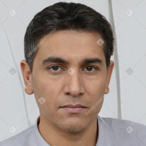 Neutral white young-adult male with short  black hair and brown eyes