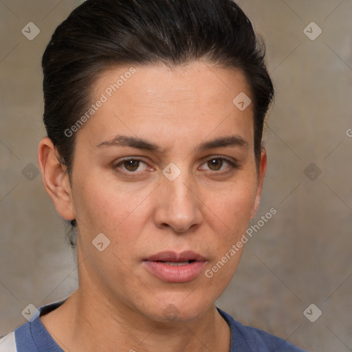 Joyful white adult female with short  brown hair and brown eyes