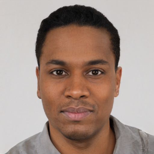 Neutral black young-adult male with short  black hair and brown eyes