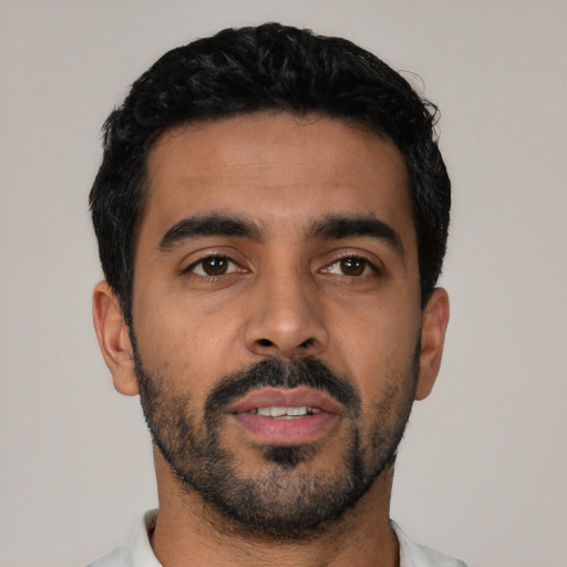 Neutral latino young-adult male with short  black hair and brown eyes