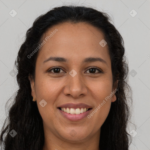 Joyful latino young-adult female with long  brown hair and brown eyes