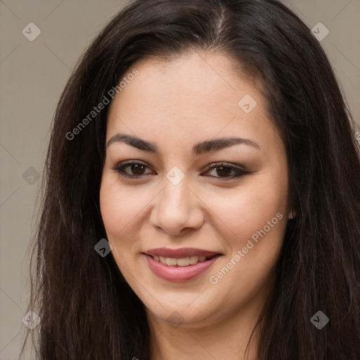 Joyful asian young-adult female with long  brown hair and brown eyes