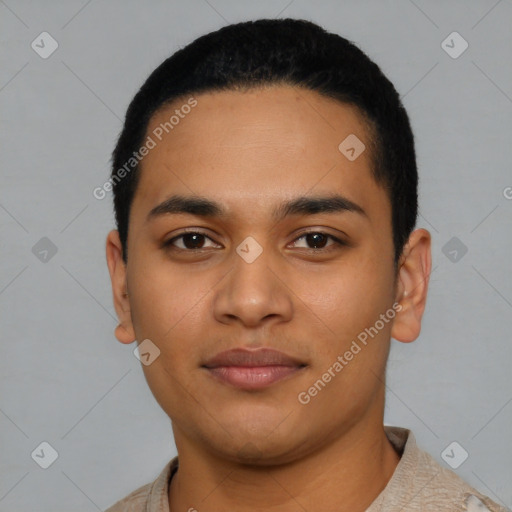 Joyful latino young-adult male with short  black hair and brown eyes