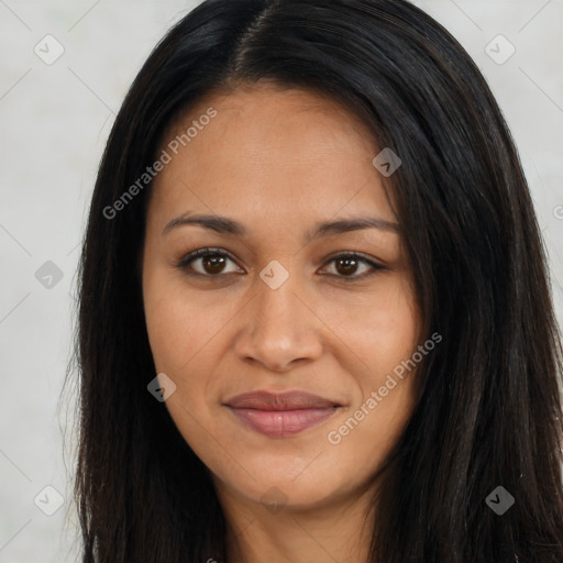 Joyful latino young-adult female with long  brown hair and brown eyes