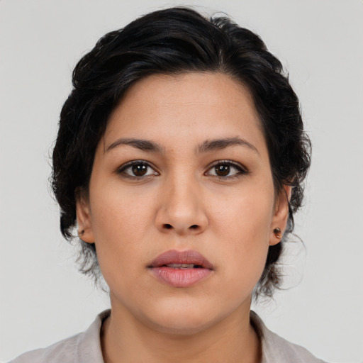 Neutral latino young-adult female with medium  brown hair and brown eyes