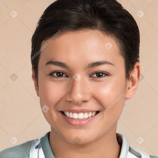 Joyful white young-adult female with short  brown hair and brown eyes