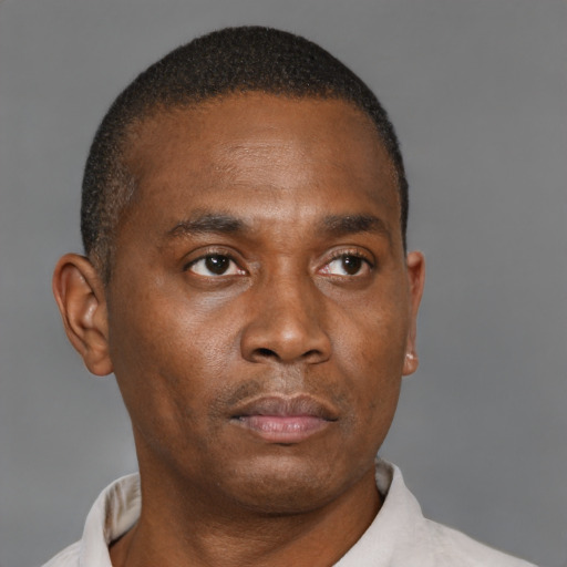 Neutral black young-adult male with short  brown hair and brown eyes