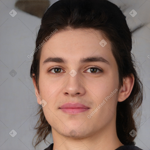 Joyful white young-adult male with medium  brown hair and brown eyes