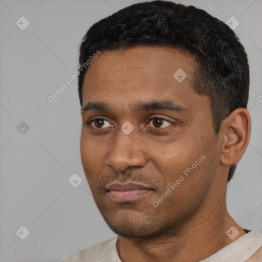 Neutral black young-adult male with short  black hair and brown eyes