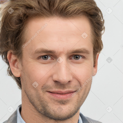 Joyful white adult male with short  brown hair and grey eyes