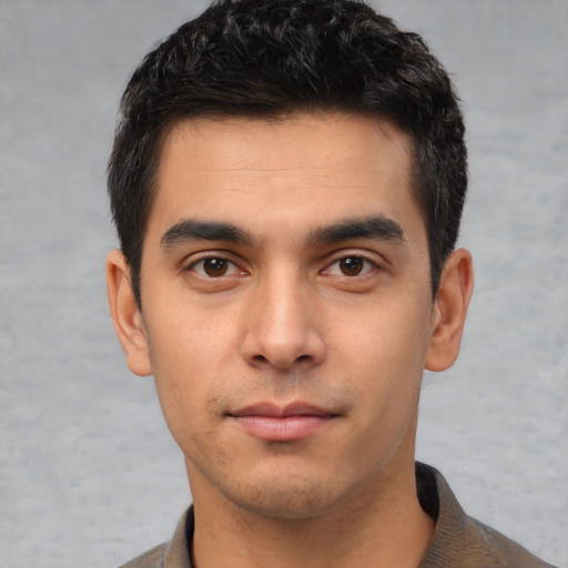 Neutral white young-adult male with short  black hair and brown eyes