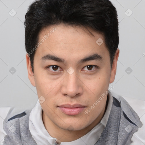 Joyful latino young-adult male with short  brown hair and brown eyes