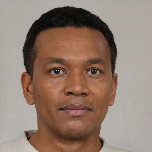 Neutral black young-adult male with short  brown hair and brown eyes