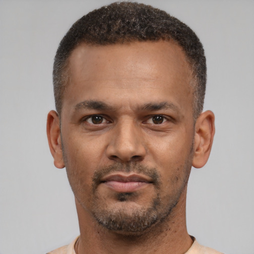 Neutral latino young-adult male with short  brown hair and brown eyes
