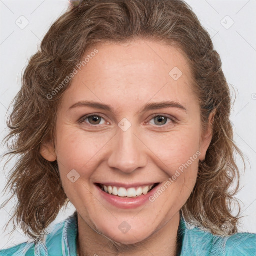 Joyful white young-adult female with medium  brown hair and blue eyes