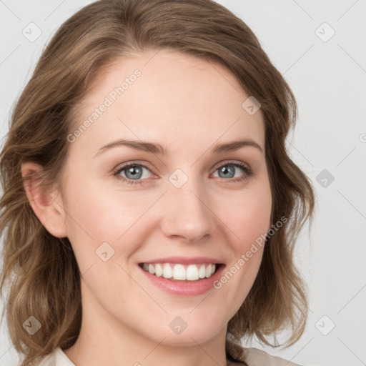 Joyful white young-adult female with medium  brown hair and green eyes