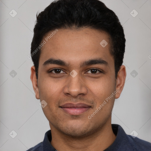 Joyful latino young-adult male with short  black hair and brown eyes