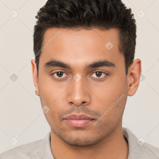 Neutral latino young-adult male with short  brown hair and brown eyes