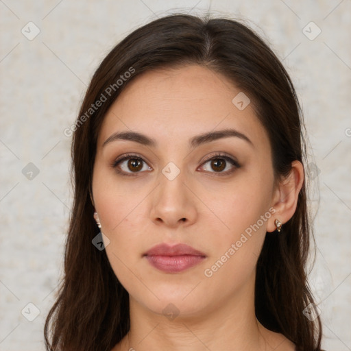 Neutral white young-adult female with long  brown hair and brown eyes