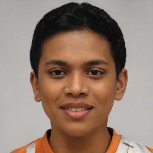 Joyful latino young-adult female with short  black hair and brown eyes