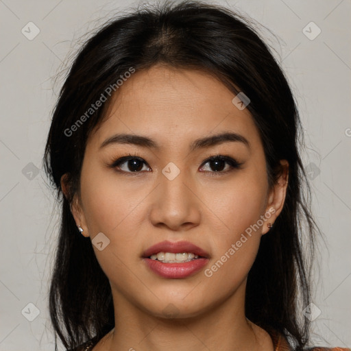 Joyful latino young-adult female with medium  brown hair and brown eyes