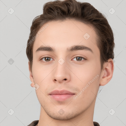 Neutral white young-adult male with short  brown hair and brown eyes