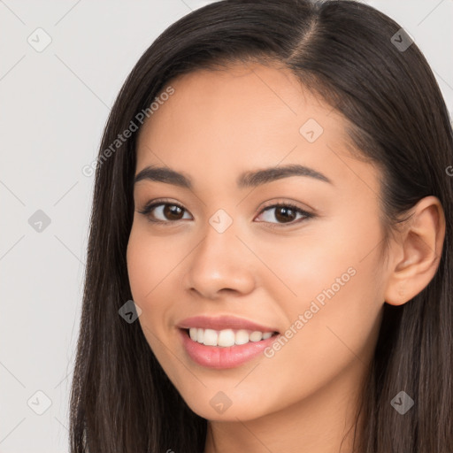 Joyful white young-adult female with long  brown hair and brown eyes