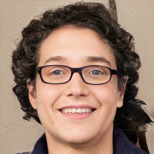 Joyful white adult male with medium  brown hair and brown eyes