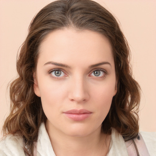 Neutral white young-adult female with medium  brown hair and green eyes