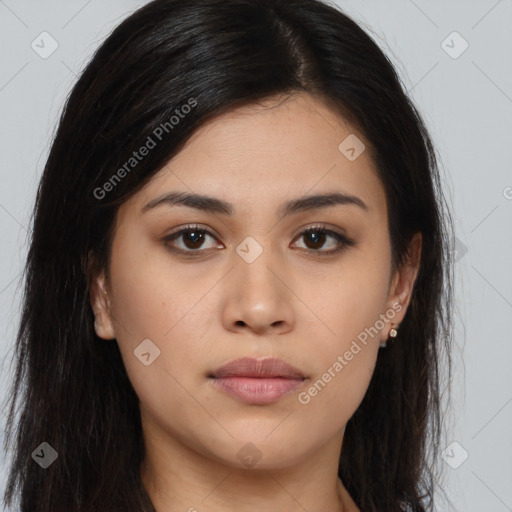 Joyful asian young-adult female with long  brown hair and brown eyes