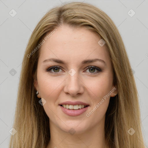 Joyful white young-adult female with long  brown hair and green eyes