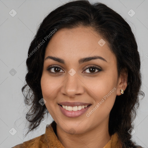 Joyful latino young-adult female with long  brown hair and brown eyes