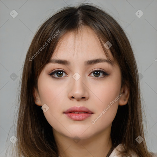 Neutral white young-adult female with long  brown hair and brown eyes