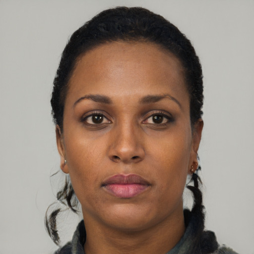 Neutral black young-adult female with long  black hair and brown eyes