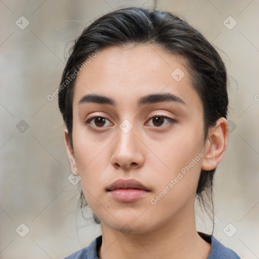 Neutral white young-adult female with medium  brown hair and brown eyes