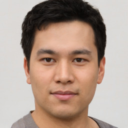 Neutral asian young-adult male with short  brown hair and brown eyes