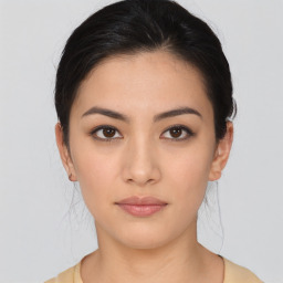 Neutral asian young-adult female with medium  brown hair and brown eyes