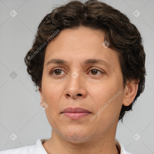 Joyful white adult female with short  brown hair and brown eyes