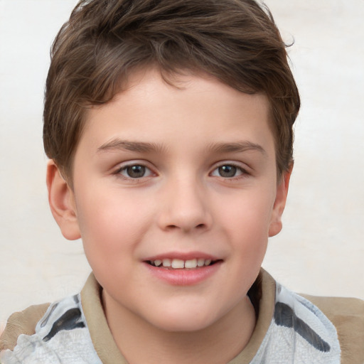 Joyful white child male with short  brown hair and brown eyes