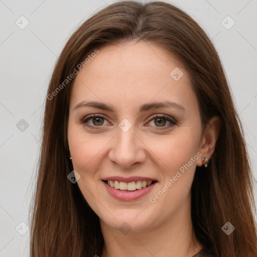 Joyful white young-adult female with long  brown hair and green eyes