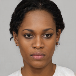 Neutral black young-adult female with short  black hair and brown eyes