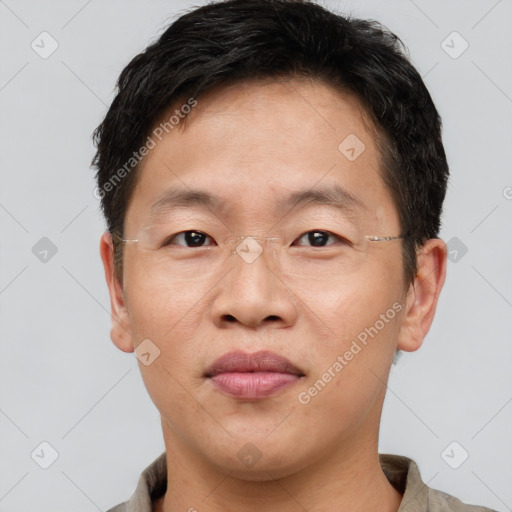 Neutral asian adult male with short  brown hair and brown eyes