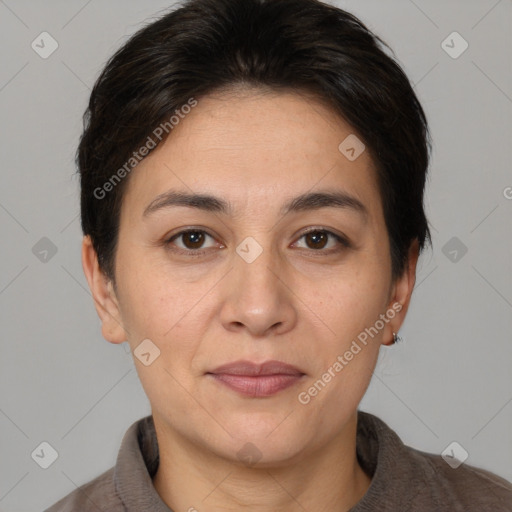 Joyful white adult female with short  brown hair and brown eyes