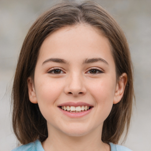 Joyful white child female with medium  brown hair and brown eyes