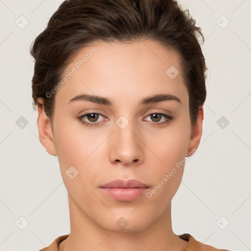 Neutral white young-adult female with short  brown hair and brown eyes