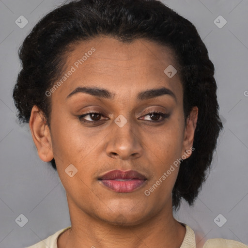 Joyful latino young-adult female with short  brown hair and brown eyes