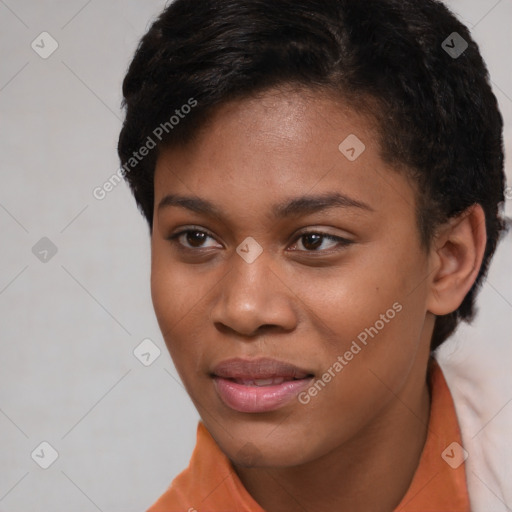 Joyful black young-adult female with short  brown hair and brown eyes