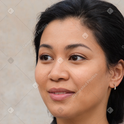 Joyful asian young-adult female with medium  brown hair and brown eyes