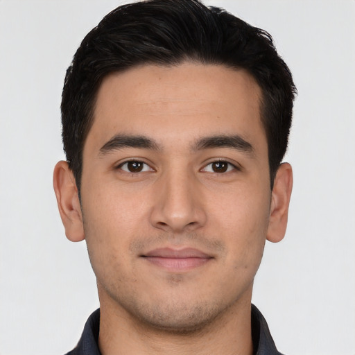 Neutral white young-adult male with short  black hair and brown eyes